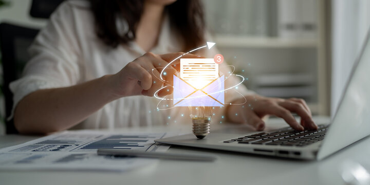Concept of digital communication and correspondence. Receiving a new message or notification in an email inbox, representing online information exchange and alerts. Fermion