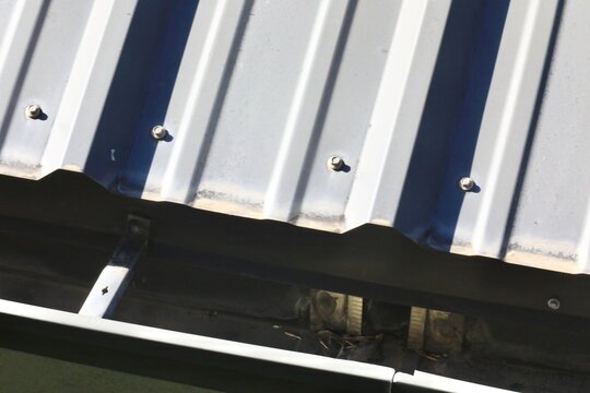 Metal type roof for slanted buildings