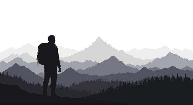 Silhouette of a hiker standing on a ridge overlooking a vast mountain range