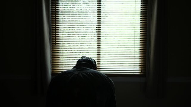 Man Battles Depression or Deals with Grief Mourning or Loss