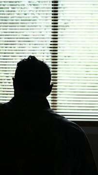 Man in his thirties experiences heart or chest pain - health concept - Vertical