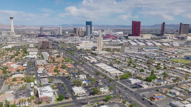 Aerial drone pullback shot of Las Vegas Strip hotels and downtown Vegas skyline