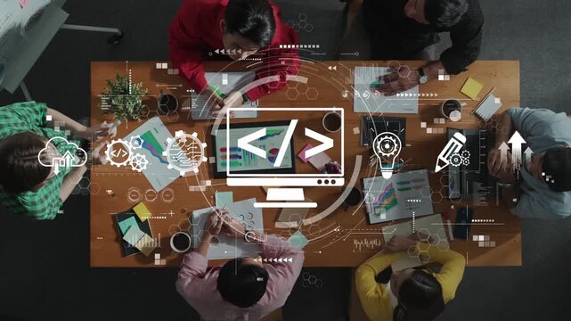 Aerial view of a diverse team engaged in collaborative work in a modern office, with digital interfaces illustrating software development and data analysis concepts. Raster