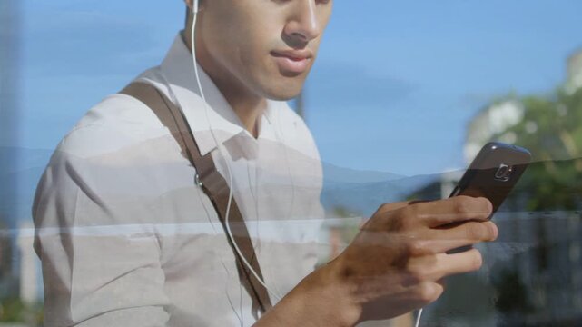 Commuter on urban sidewalk glancing at phone and tapping screen, causing tech overlays animating UI