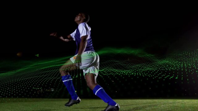 Player shifting as soccer ball incoming, green wave intersecting legs controlling ball running left