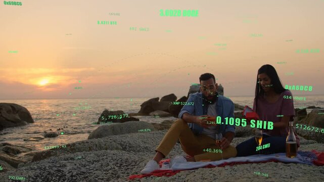 Man tapping phone checking crypto HUD, woman viewing box while 0