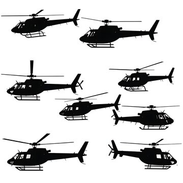 Collection of helicopter silhouettes flying.