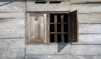 Fototapeta premium old wooden window on vintage house