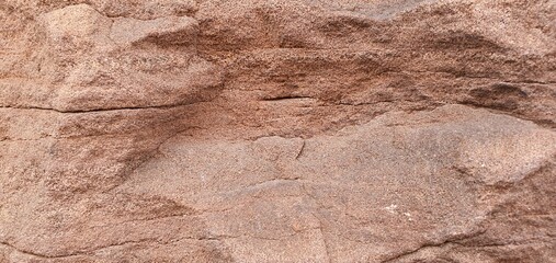 Abstract macro of scorched red mineral surface resembling Mars planet landscape. Gritty volcanic rock texture with deep craters, ideal for Sci-Fi and game environment © maggrat