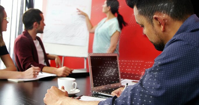Taking notes right blue-shirt man using laptop at meeting table with flipchart coffee, copy space