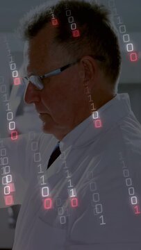 Vertical video: Lab scientist lifting vial to light, analyzing sample under binary overlay growing