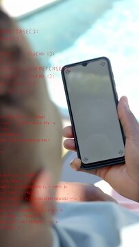 Vertical video: Man by pool lifting phone causing red tech column overlaying right checking markers