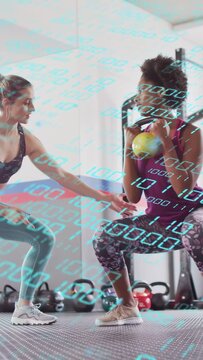 Vertical video: Trainee lowering kettlebell squat coach cueing form in gym with blue binary overlay