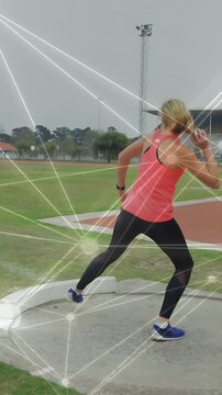 Vertical video: Thrower shifting stance and releasing shotput to field with node overlay for sports