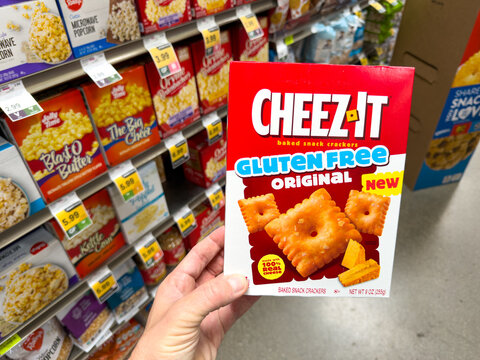 Cheez It Original Gluten Free Crackers Box Held in Grocery Store Aisle