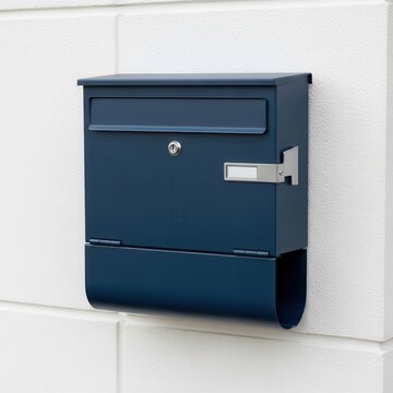 Modern Blue Mailbox Mounted on a White Wall.