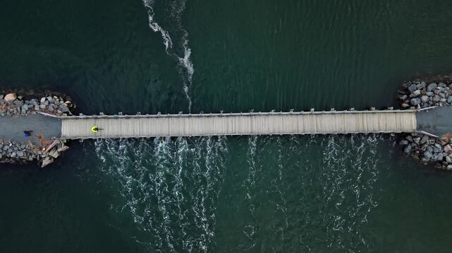 Top View Cyclist Riding Over Wooden Bridge Salt Marsh Trail Cole Harbour Heritage Park Halifax Nova Scotia Canada Ocean Inlet Coastal Scene Active Lifestyle Outdoor Recreation Scenic Nature