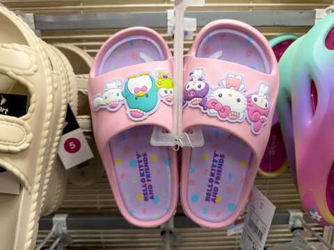 Girls Hello Kitty Character Slide Sandals On Retail Display