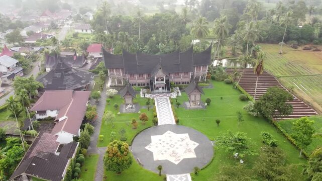 Aerial view using a drone, the traditional house of the Minangkabau tribe, called the Rumah Gadang, in West Sumatra, Indonesia