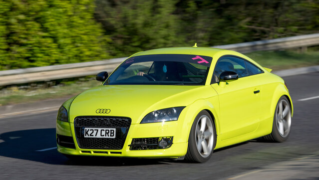 Milton Keynes,Bucks,UK - Apr 23rd 2026:  2006 Audi tt coupe car driving on a British road