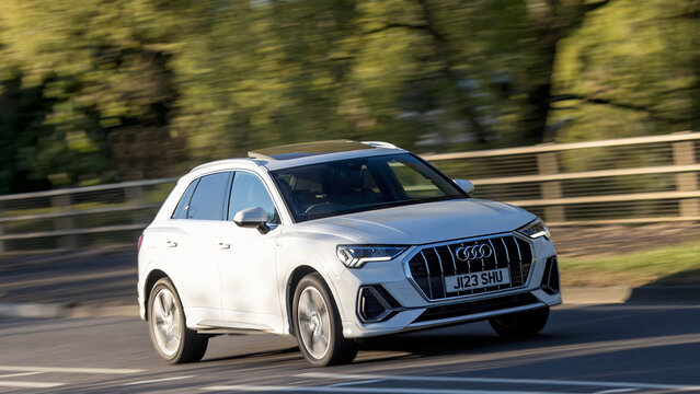 Milton Keynes,Bucks,UK - Apr 24th 2026:  2020 white Audi Q3 diesel engine car driving on a British road