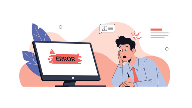 Worried businessman looking at red error message on computer screen in office environment representing technical problems.