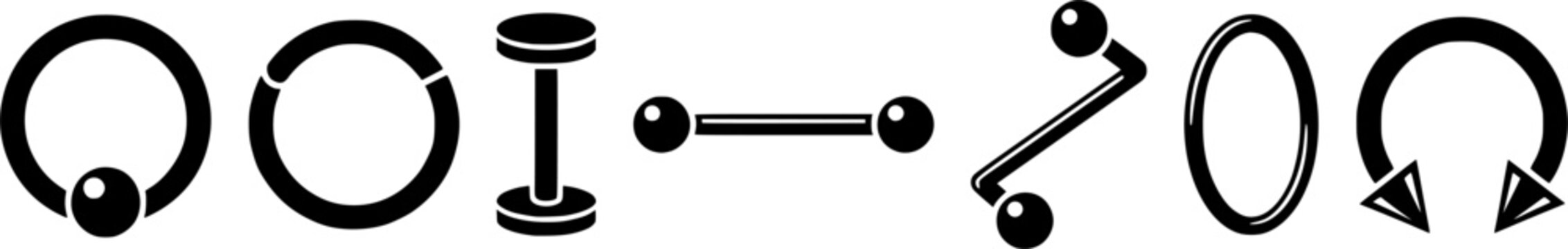Different types of body piercing jewelry such as barbells, rings, and labrets for modern fashion accessory use
