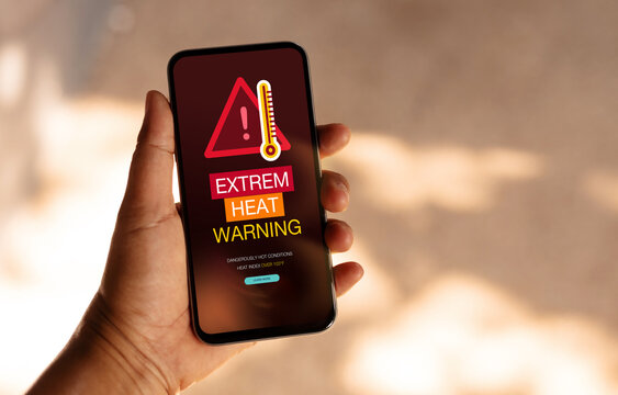 Extreme heat warning, climate change impact, heatwave alert on Mobile phone