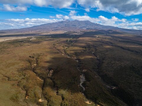Aerial view of Mount Ruapehu, an active stratovolcano at the southern end of the Taupo Volcanic Zone in New Zealand. The mountain is a popular destination for hiking and skiing.