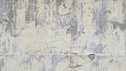 Obraz premium Weathered concrete wall texture with peeling paint, showing signs of age and decay, perfect for backgrounds and graphic design elements