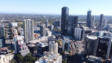 Fototapeta premium New apartment and office towers under construction driving growth & development 