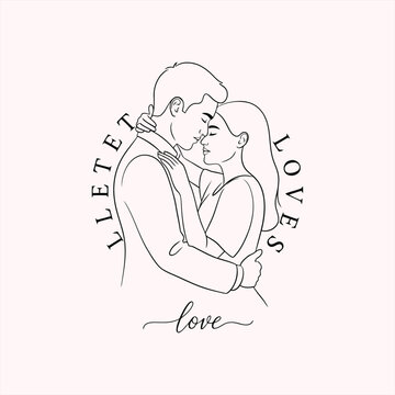 Couple shares tender moment with love inscription around them
