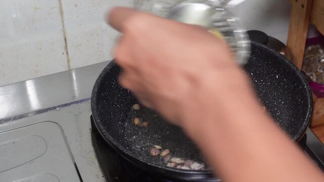 Cooking Omelet in Black Pan Close Up Video