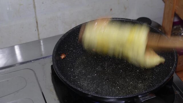 Cooking Omelet in Black Pan Close Up Video