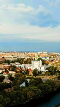 Vertical video. Tula, Russia. Tula Kremlin, Kazanskaya embankment. General panorama of the city from the air. Drone footage. Rich colors