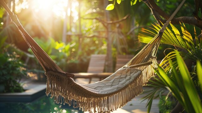 A serene hammock suspended in a lush, tropical garden during sunset. The scene captures the tranquil moment of relaxation amidst nature's vibrant hues.