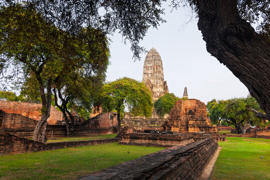 Wat Ratchaburana prang standing among ancient Ayutthaya ruins