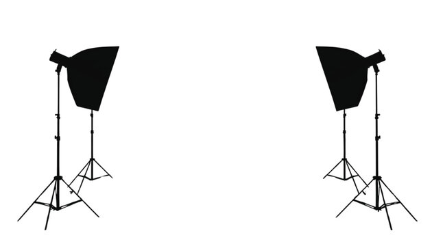 Studio lights on tripods stand in a symmetric arrangement to provide professional illumination for photography or video production sets.