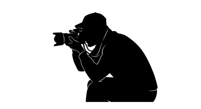 Man holding a camera and pointing.