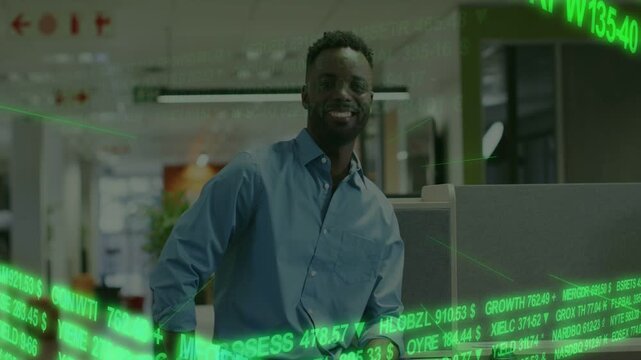 Male office pro leaning on desk as green market ticker sweeping frame causing shift tracking stocks