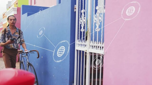 Man pushing bike checking phone, starting nodes growing across bluepink wall showing links