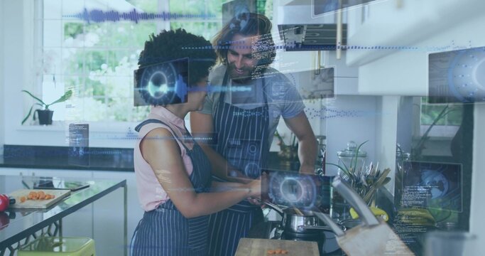 Cooking couple wearing blue-striped aprons stirring saucepan in modern home kitchen with AR overlay