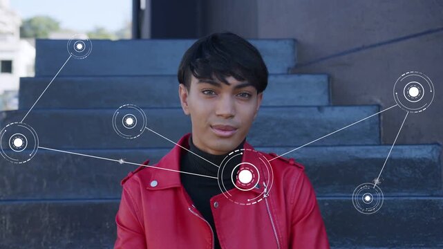 Man sitting on concrete steps, reacting as circular HUD elements expanding from chest for tech demo