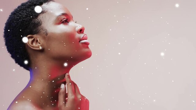Overlay appearing, causing model touching chin as particles drifting front and behind for beauty