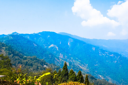 Panoramic view of Sittong, Darjeeling, West Bengal, India. Panoramic view of blue mountains peaks ridge.