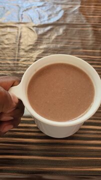 Cup of Traditional Red Corn Pinole Atole