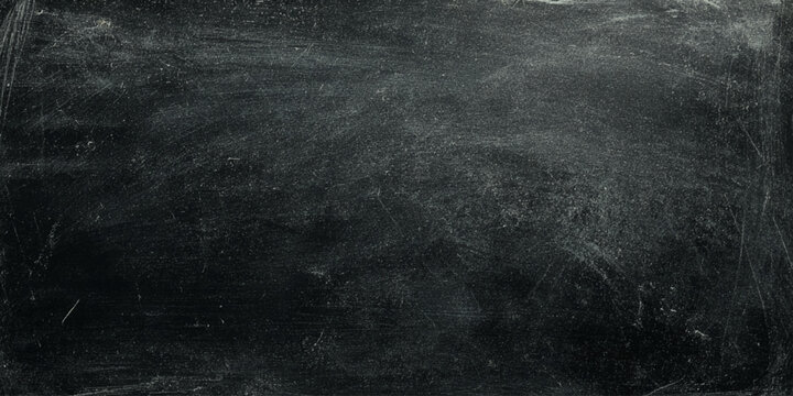 Dark wall  scratched blackboard texture background with white chalk marks and smudges for design and education concepts