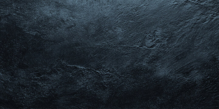 Dark wall slate stone texture background with rough surface and blue undertones for design and decoration