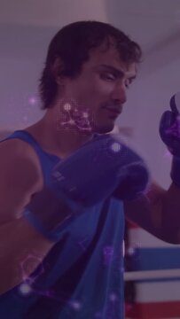 Vertical video: Boxer checking gloves and throwing jabs for boxing training, purple sparks over man