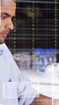 Vertical video: Software dev typing on laptop at counter, input causing binary UI guiding bug fix